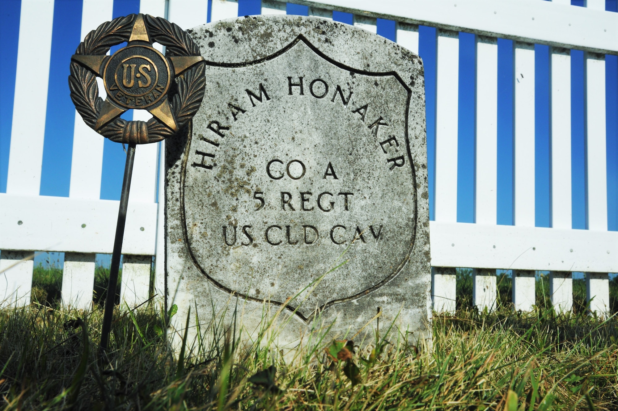 A limestone grave marker at Cox Family Cemetery is broken and worn. Many of the headstones are illegible, damaged, or even missing. (U.S. Air Force Photo/Isa Velez)