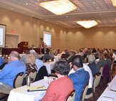 Ruthann Haider, Chief of Contracting for the Walla Walla District, presents a holistic view of the contracting process during the 2018 Industry Day, Oct. 10, held at the Marcus Whitman Hotel and Conference Center in Walla Walla, Washington.