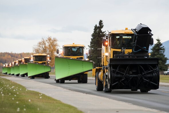 The 773d Civil Engineer Squadron conducts the annual Snow and Ice Parade at Joint Base Elmendorf-Richardson, Alaska, Oct. 4, 2018. Regardless of the amount of snowfall, the snow barn works to keep the runways and roads clear and ready for emergency missions 24/7.