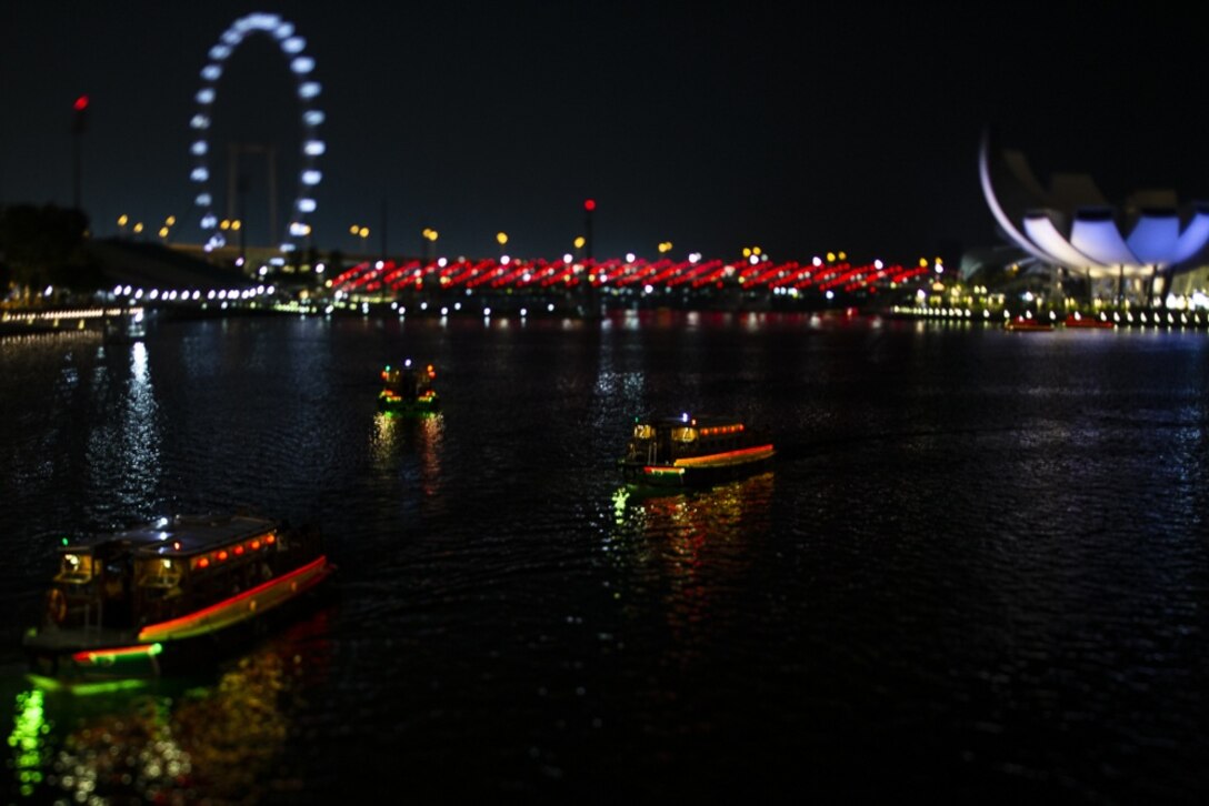 River boats navigate the Singapore River, Oct. 4, 2018. Marines and Sailors with the 31st Marine Expeditionary Unit arrived in the “Lion City” aboard the amphibious assault ship USS Wasp (LHD 1) October 2 for a port visit after more than a month at sea during a regularly-scheduled patrol of the Indo-Pacific region.