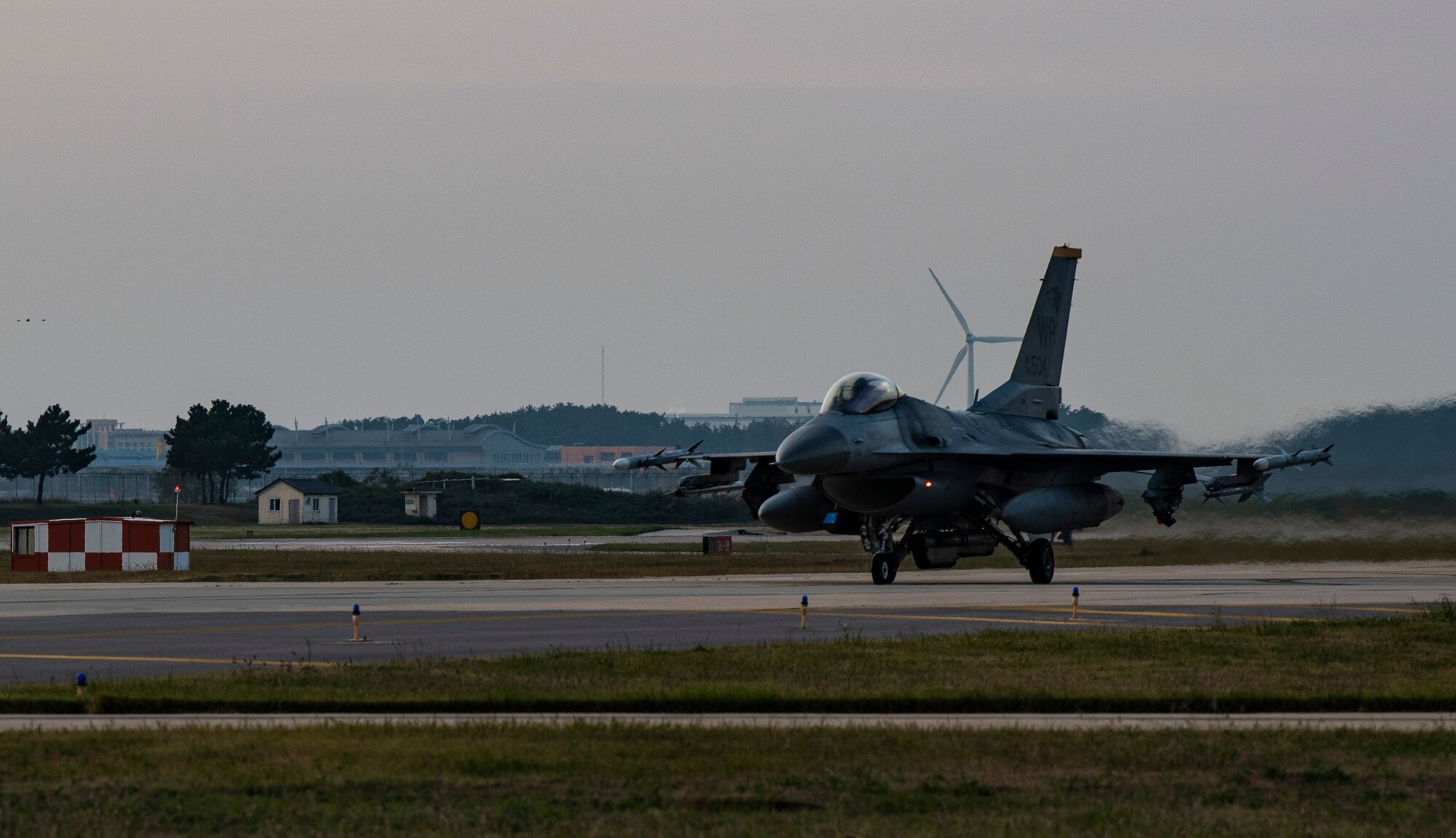An F-16 Fighting Falcon from the 80th Fighter Squadron “Juvats” taxis down a runway at Kunsan Air Base, Republic of Korea, Oct. 4, 2018. The 80th FS is participating in Red Flag-Alaska, a 10-day United States Air Force exercise that emphasizes air-to-air combat, held at Eielson Air Force Base. (U.S. Air Force photo by Senior Airman Stefan Alvarez)