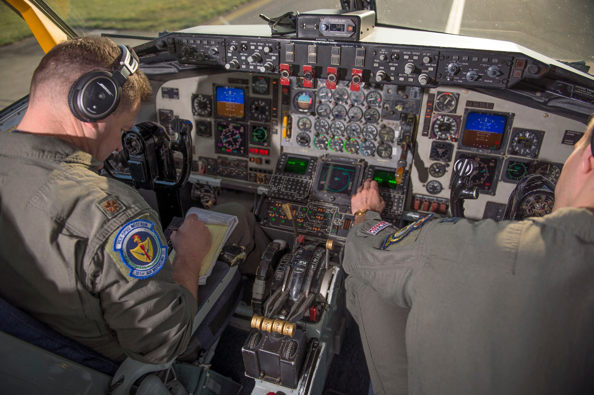 U.S. Air Force Maj. Steven Strasbaugh, and Capt. Zachary Overbey, 351st Air Refueling Squadron pilots, perform pre-flight checks on the KC-135 Stratotanker prior to a mission for a large forces exercise, at RAF Mildenhall, England, Oct. 10, 2018. RAF Lakenheath hosted a large forces exercise that included F-22 Raptors from Joint Base Langley-Eustis, Va., F-15E Strike Eagles from RAF Lakenheath and F/A-18 Super Hornets from the Carrier Air Wing from USS Harry S. Truman (CVN-75). (U.S. Air Force photo by Staff Sgt. Christine Groening)