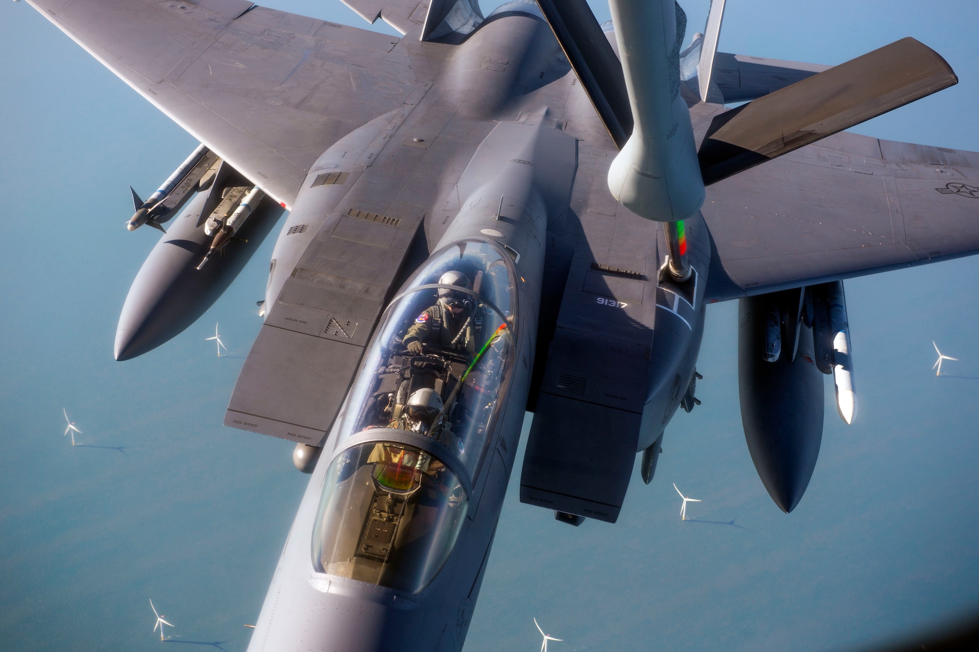 A U.S. Air Force F-15E Strike Eagle assigned to RAF Lakenheath, England, takes on fuel from a U.S. Air Force KC-135 Stratotanker assigned to RAF Mildenhall, England, off the coast of England, Oct. 10, 2018. RAF Lakenheath hosted a large forces exercise that included F-22 Raptors from Joint Base Langley-Eustis, Va., F-15E Strike Eagles from RAF Lakenheath and F/A-18 Super Hornets from the Carrier Air Wing from USS Harry S. Truman (CVN-75). (U.S. Air Force photo by Staff Sgt. Christine Groening)