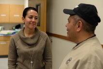 Chief Master Sgt. Eryn McElroy, 341st Missile Wing command chief, talks to Lt. Col. Paul Castillo, 341st MW chaplain, during a dorm dinner Sept. 27, 2018, at Malmstrom Air Force Base, Mont.