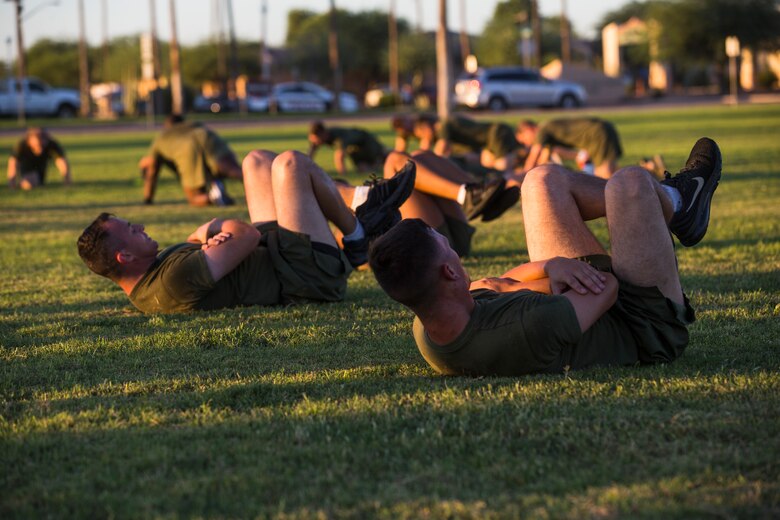 Marines, Sailors, and civilians aboard Marine Corps Air Station (MCAS) Yuma participate in High Intensity Tactical Training (HITT) on the Lawn, at the parade deck on MCAS Yuma, Ariz., Sept. 28, 2018. HITT on the Lawn is a physical training event that is open to anyone with base access and provides them with a physical training opportunity. (U.S. Marine Corps photo taken by Cpl. Isaac D. Martinez)