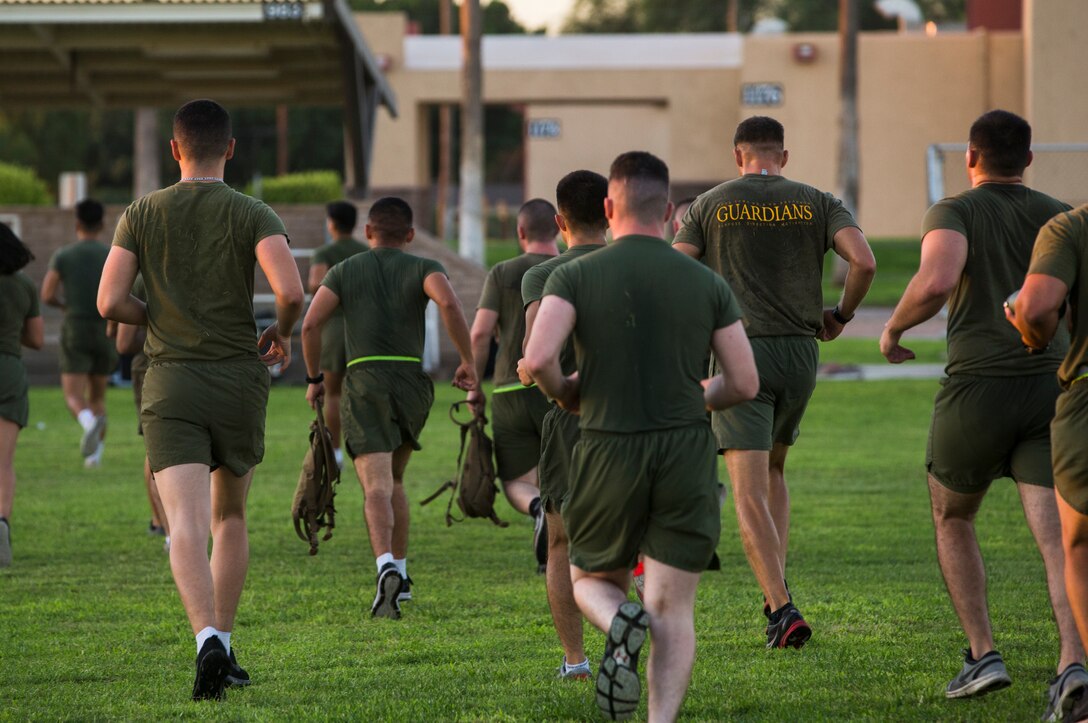 Marines, Sailors, and civilians aboard Marine Corps Air Station (MCAS) Yuma participate in High Intensity Tactical Training (HITT) on the Lawn, at the parade deck on MCAS Yuma, Ariz., Sept. 28, 2018. HITT on the Lawn is a physical training event that is open to anyone with base access and provides them with a physical training opportunity. (U.S. Marine Corps photo taken by Cpl. Isaac D. Martinez)