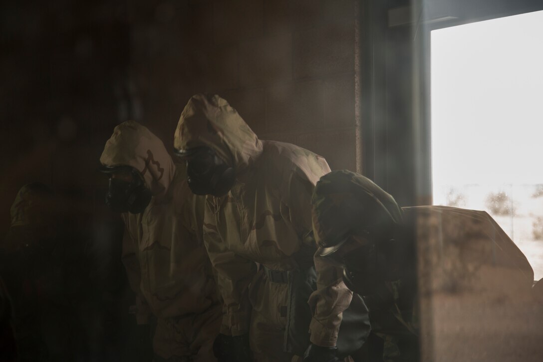 U.S. Marines stationed at Marine Corps Air Station (MCAS) Yuma, conduct their annual Chemical, Biological, Radiological and Nuclear Defense (CBRN) Training at the MCAS Yuma Gas Chamber July 26, 2018. The gas chamber is a controlled environment in which a non-lethal gas is released. This trains Marines to have confidence in their gear and become familiar with the effects of gas. (U.S. Marine Corps Photos by Lance Cpl. Sabrina Candiaflores)
