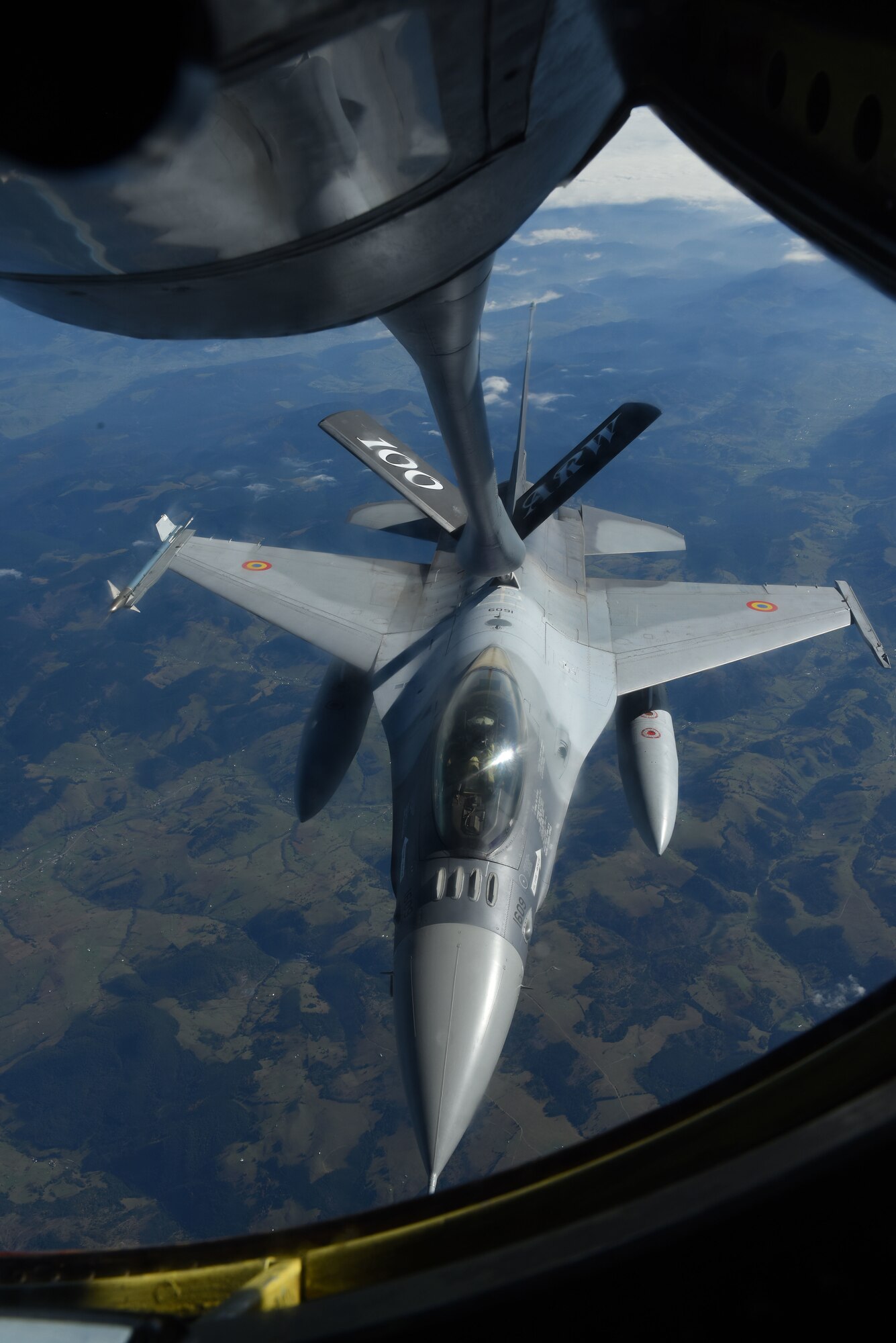 A Romanian air force F-16 Fighting Falcon receives fuel from a U.S. Air Force KC-135 Stratotanker from RAF Mildenhall, England, during Exercise Clear Sky over Romania, Oct. 10, 2018. The exercise is a joint and multinational exercise that involved approximately 950 personnel from nine nations. (U.S. Air Force photo by Senior Airman Luke Milano)