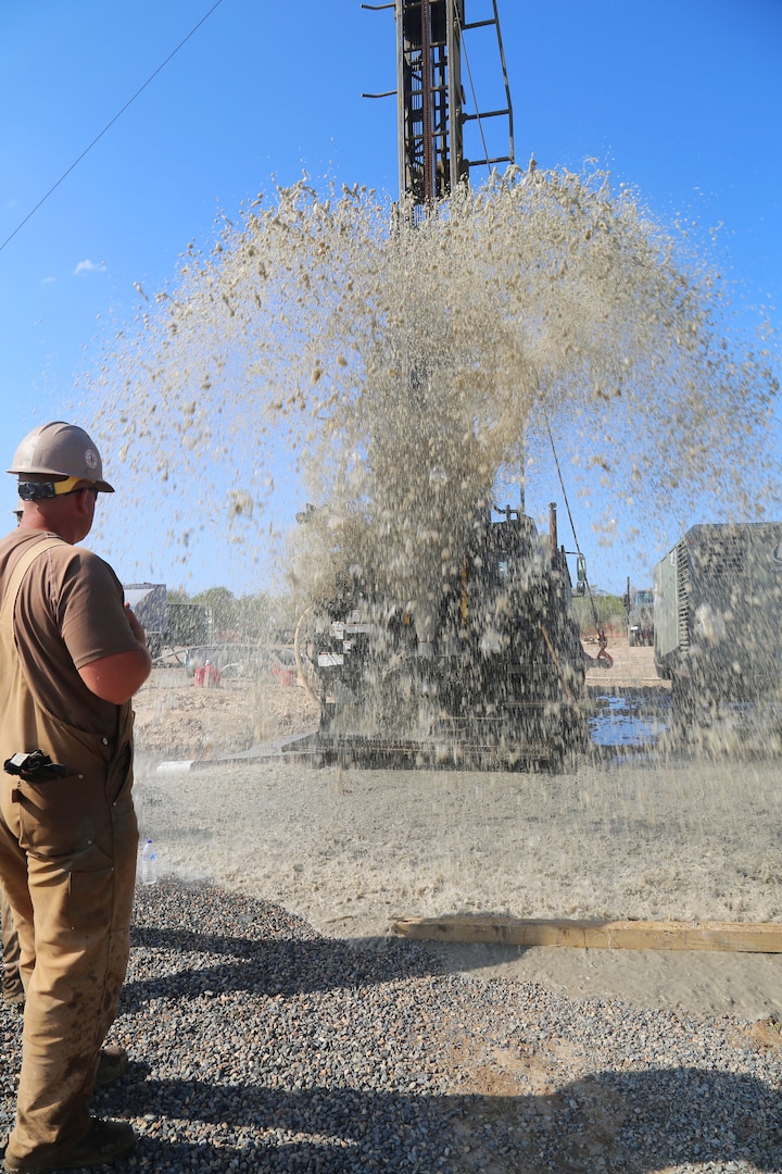 A U.S. Navy Seabee observes air developing operations in Riohacha, Colombia, Sept. 11, 2018, during water-well drilling exploration operations.