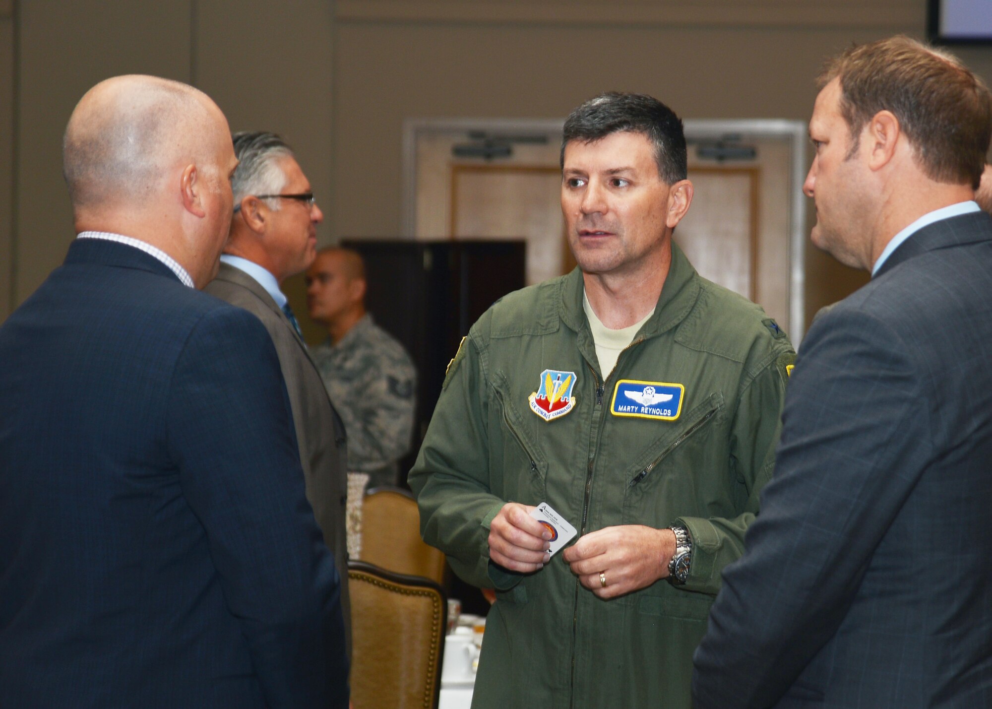 U.S. Air Force Brig. Gen. George “Marty” Reynolds, vice commander, Twenty-Fifth Air Force, speaks with attendees at the Armed Forces Communications and Electronics Association (AFCEA) luncheon Sept. 18, 2018.