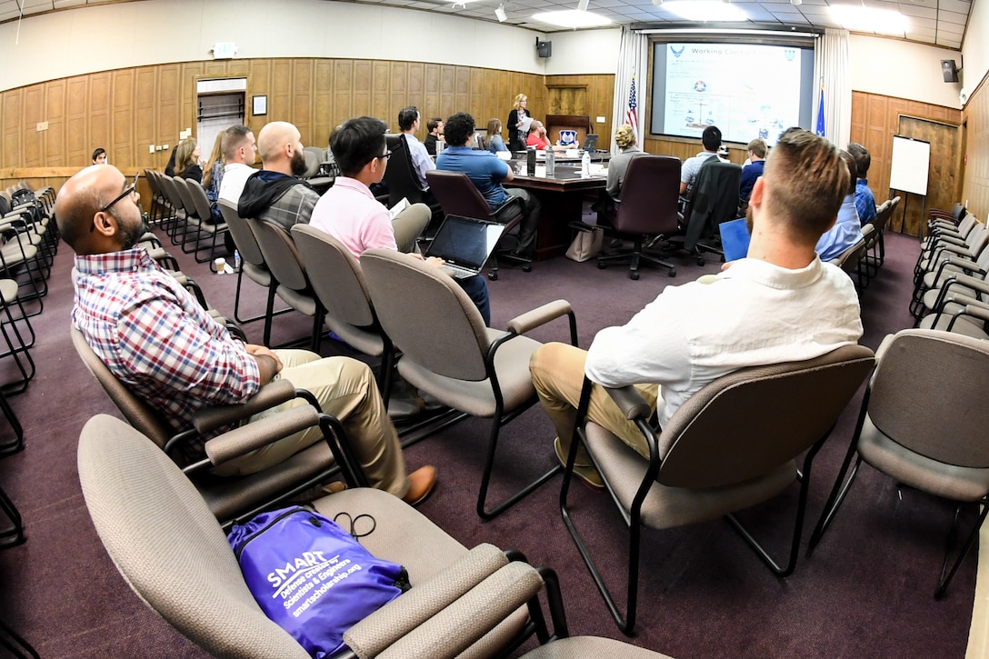 Science and Engineer Palace Acquire, or S&E PAQ, program participants attend a briefing about S&E careerfields in the Air Force during a base visit Sept. 20, 2018, at Hill Air Force Base, Utah. The visit included tours to showcase the various science, technology, engineering and math, or STEM, jobs available at Hill. (U.S. Air Force photo by Cynthia Griggs)