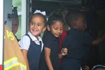 Children at Elliott Elementary School get a tour of a fire truck on Laurel Bay, Oct. 9. The tour was held to educate the students about fire safety as well as fire prevention techniques in recognition of “National Fire Prevention Week”.