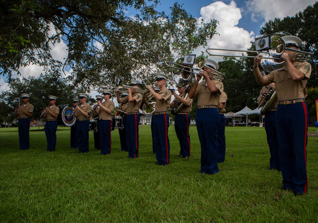 U.S. Marine Corps band members with the Marine Forces Reserve Band perform during the Algiers Festival 2018 in Federal City, New Orleans, Oct. 6, 2018. The band performed to show their support towards the New Orleans community and kicked off the Algiers Festival 2018. (U.S. Marine Corps photo by Cpl, Andy O. Martinez)
