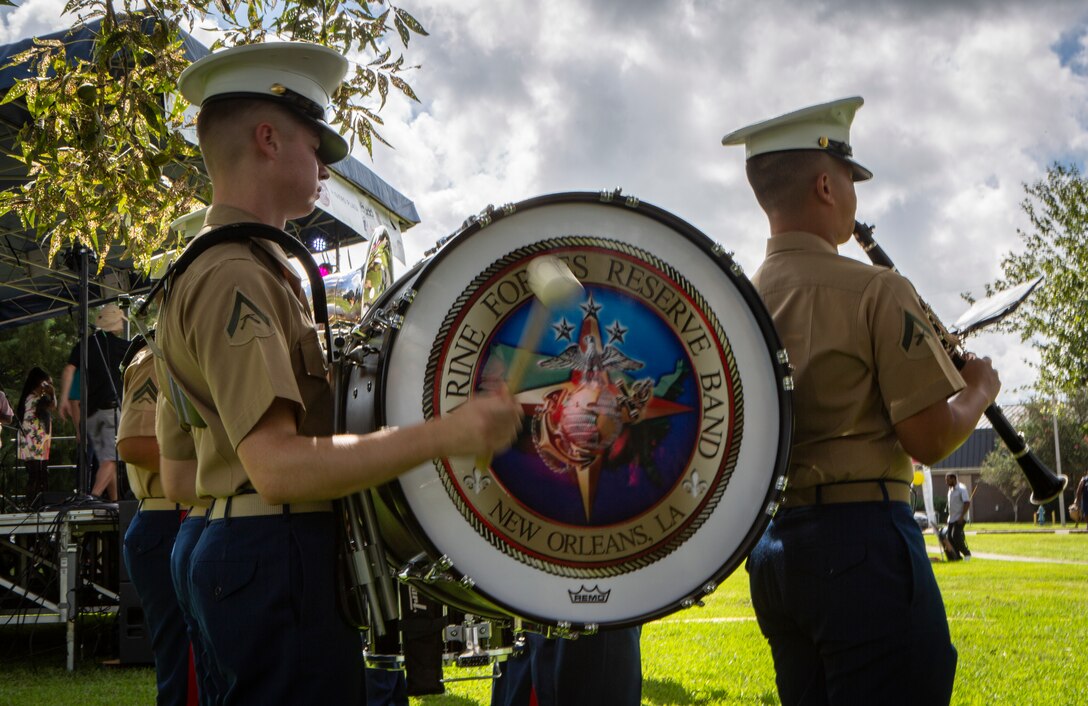 Lance Cpl. Brendan Malle, a percussionist with the Marine Forces Reserve Band, performs during the Algiers Festival 2018 in Federal City, New Orleans, Oct. 6, 2018. The band performed to show their support towards the New Orleans community and kicked off the Algiers Festival 2018. (U.S. Marine Corps photo by Cpl, Andy O. Martinez)