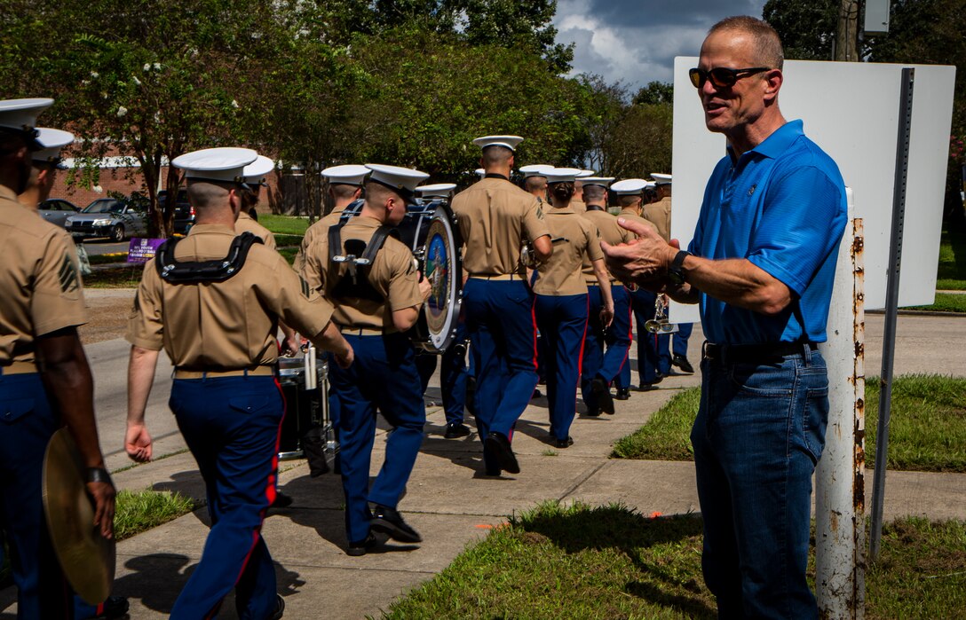 Maj. Gen. Burke W. Whitman, commander of Marine Forces Reserve and Marine Forces North, gives a round of applause to the MARFORRES Band during the Algiers Festival 2018 in Federal City, New Orleans, Oct. 6, 2018. The band performed to show their support towards the New Orleans community and kicked off the Algiers Festival 2018. (U.S. Marine Corps photo by Cpl, Andy O. Martinez)