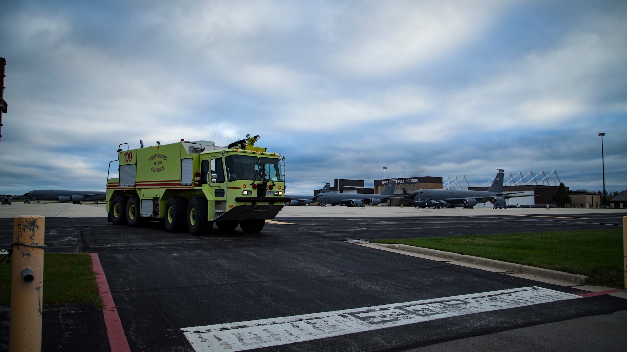 A U.S. Air Force fire protection truck assigned to the 128th Air Refueling Wing Fire Department sits on the ramp ready for response, Milwaukee, Wisconsin, Oct. 11, 2018.