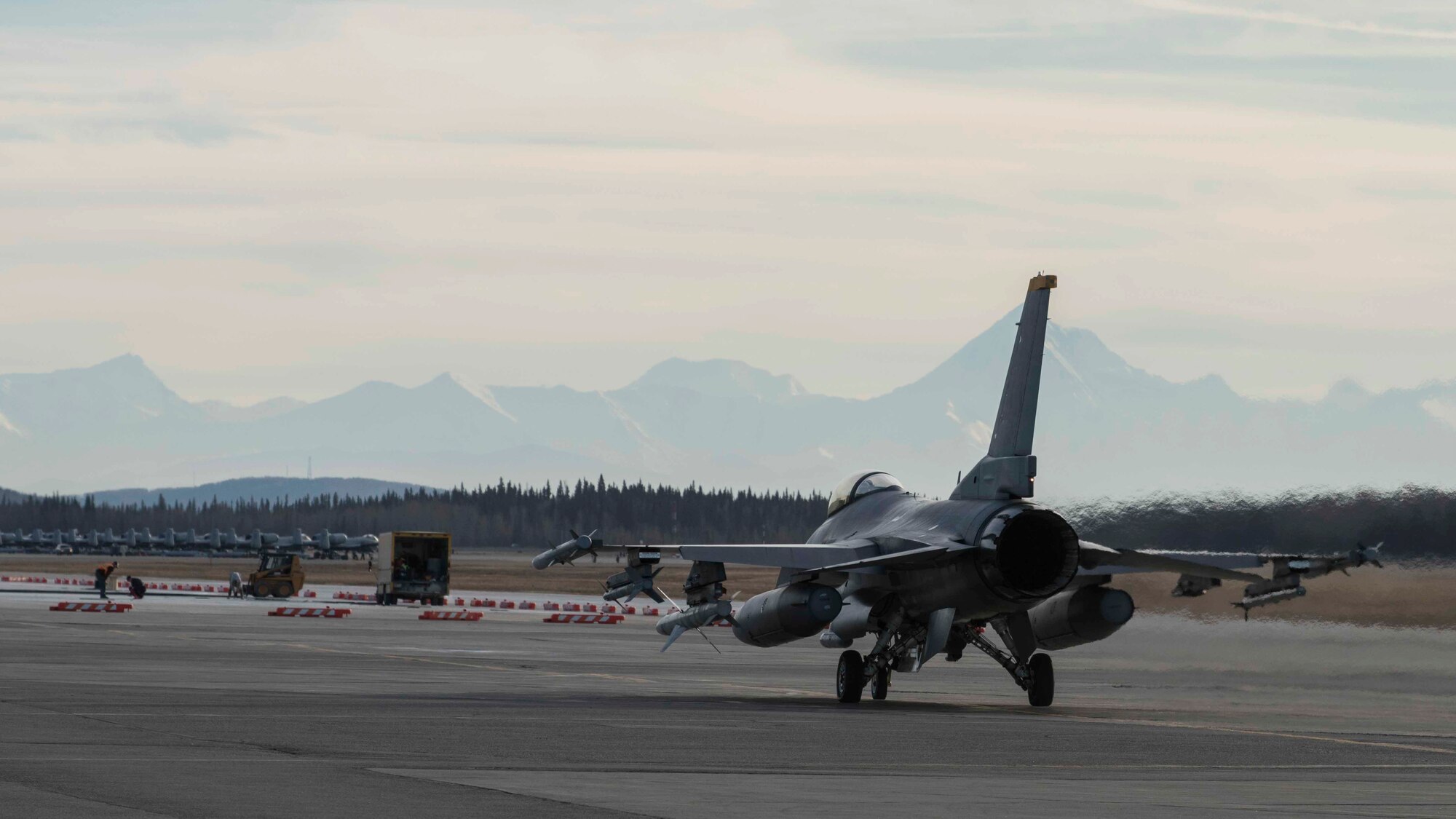 A U.S. Air Force F-16 Fighting Falcon taxis down the runway during exercise Red Flag-Alaska 19-1, at Eielson Air Force Base, Alaska, Oct. 9, 2018. During the exercise, Team Misawa maintainers worked diligently to inspect and repair multiple jets prior to take-off enhancing pilot safety. (U.S. Air Force photo by Airman 1st Class Collette Brooks)
