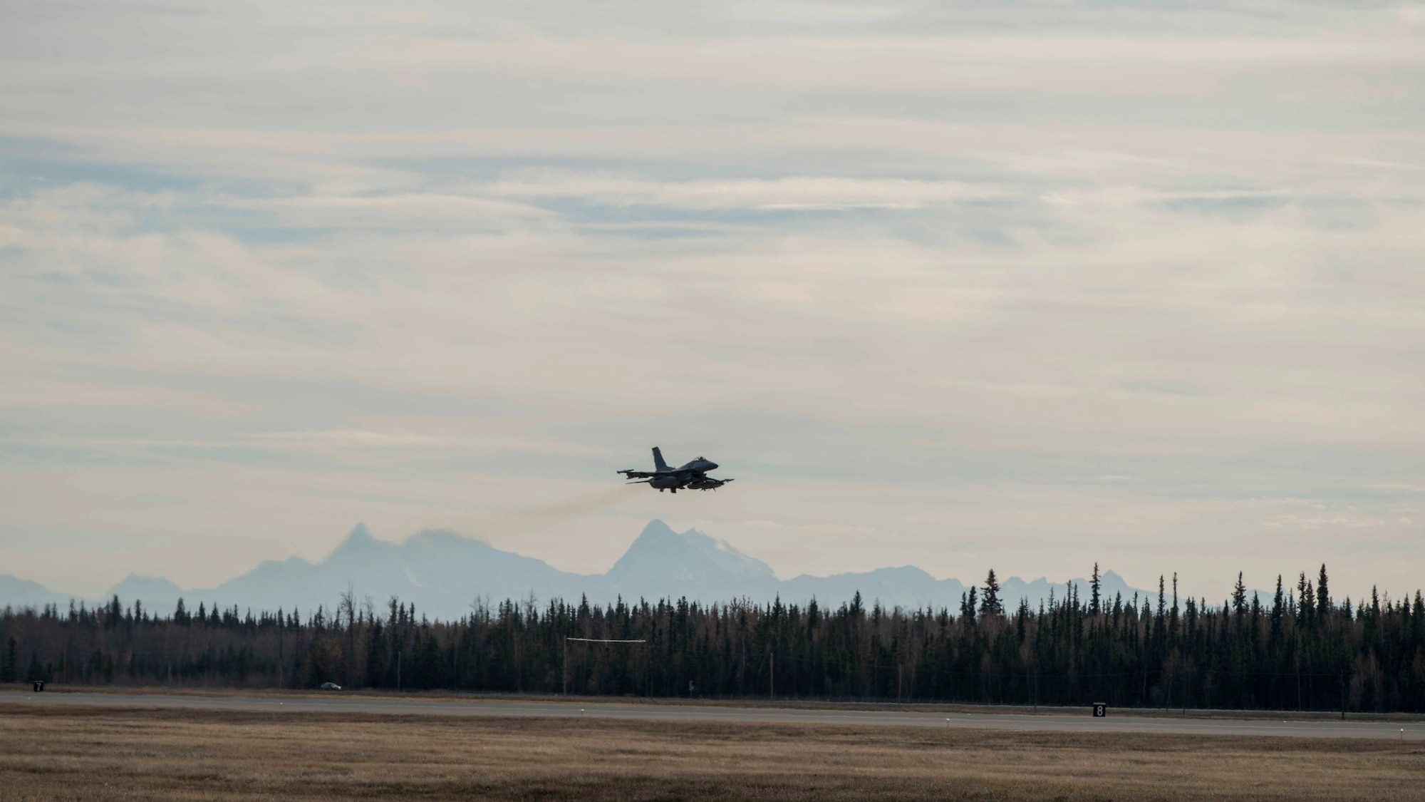 A U.S. Air Force F-16 Fighting Falcon takes flight during exercise Red Flag-Alaska 19-1, at Eielson Air Force Base, Alaska, Oct. 9, 2018. During the exercise, Misawa Air Base maintainers work diligently to inspect and repair multiple jets prior to take-off in order to enhance pilot safety. (U.S. Air Force photo by Airman 1st Class Collette Brooks)