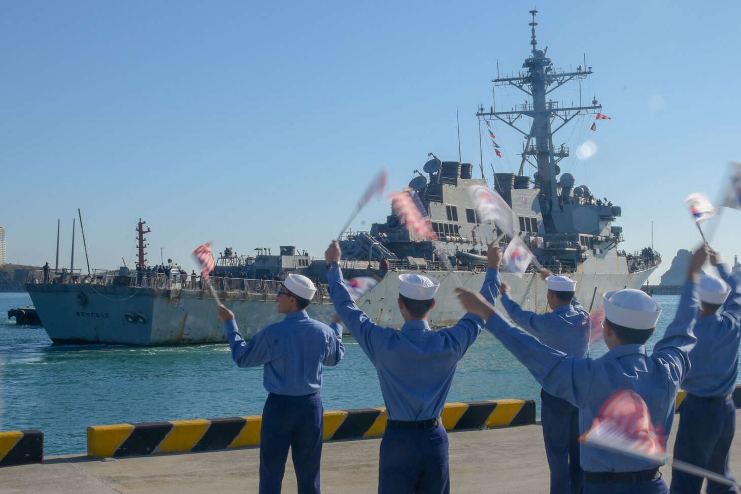 BUSAN, Republic of Korea (Oct. 12, 2018) Arleigh Burke-class guided-missile destroyer USS Benfold (DDG 65) arrives in Commander, Republic of Korea Fleet base pier as part of a regularly scheduled port visit. Benfold is underway with the USS Ronald Reagan (CVN 76) Carrier Strike Group and are forward deployed to the U.S. 7th Fleet area of operations in support of security and stability in the Into-Pacific region.
