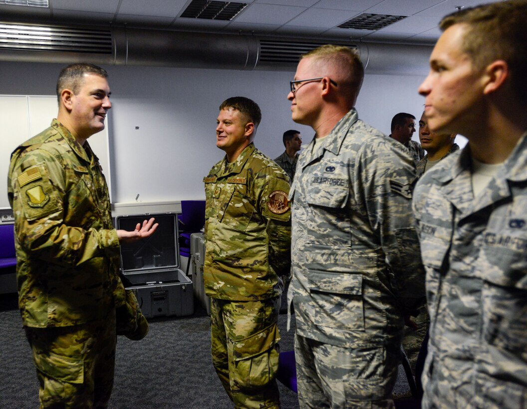 U.S. Air Force Brig. Gen. Mark R. August, 86th Airlift Wing commander, speaks with Airmen of the 86th Aircraft Maintenance Squadron during an immersion tour of the 86th Maintenance Group on Ramstein Air Base, Germany, Oct. 9, 2018. August and Chief Master Sgt. Ernesto J. Rendon Jr., 86th AW command chief, used the immersion as a way to get a better understanding of the 86th MXG’s capabilities as well as a way for Airmen to ask questions directly to the wing leaders. (U.S. Air Force photo by Staff Sgt. Timothy Moore)