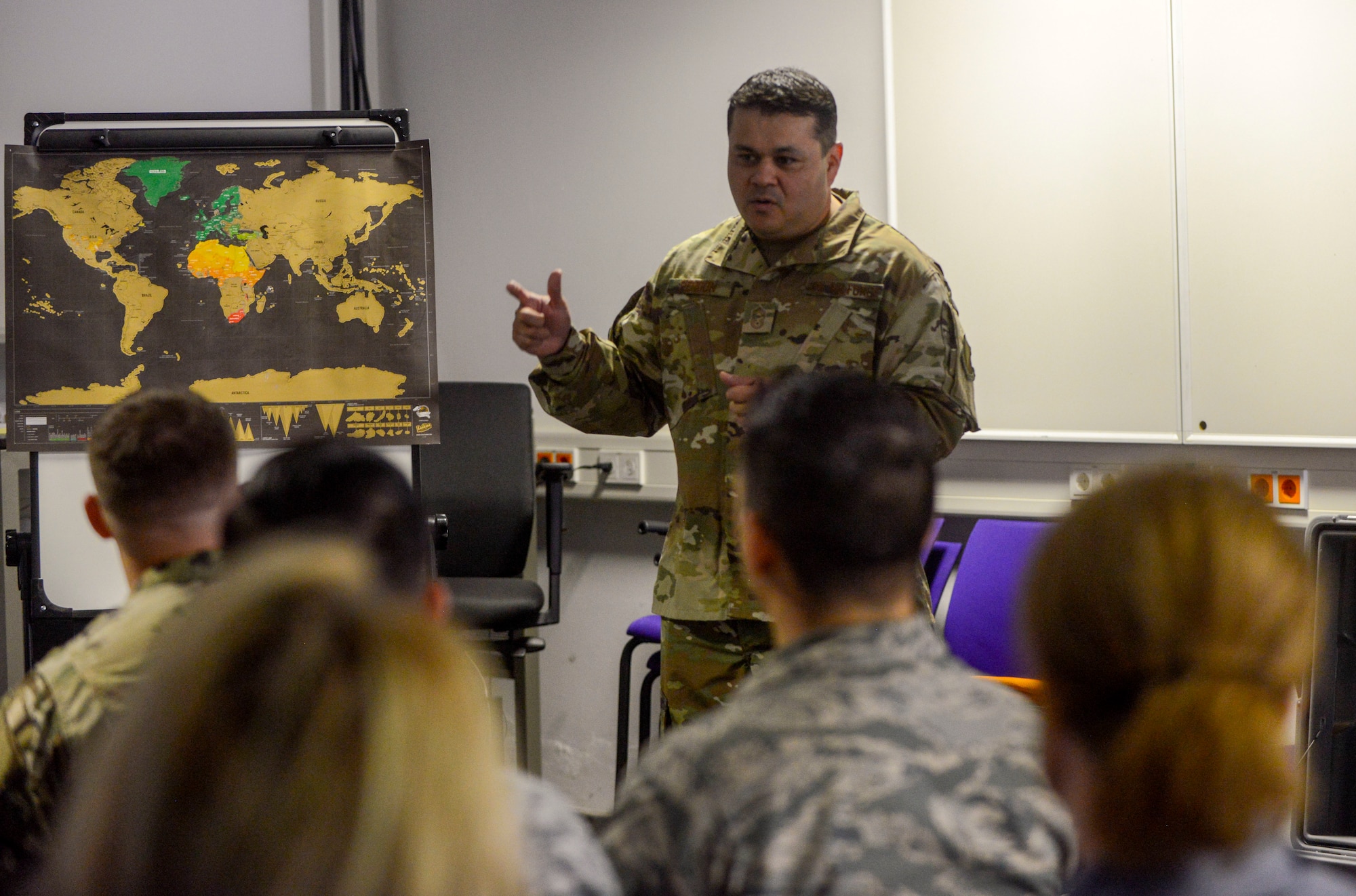 U.S. Air Force Chief Master Sgt. Ernesto J. Rendon Jr., 86th Airlift Wing command chief, talks to Airmen of the 86th Aircraft Maintenance Squadron during an immersion tour of the 86th Maintenance Group on Ramstein Air Base, Germany, Oct. 9, 2018. Rendon and Brig. Gen. Mark R. August, 86th AW commander, used the immersion as a way to get a better understanding of the 86th MXG’s capabilities as well as a way for Airmen to ask questions directly to the wing leaders. (U.S. Air Force photo by Staff Sgt. Timothy Moore)