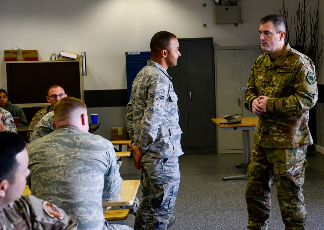U.S. Air Force Brig. Gen. Mark R. August, 86th Airlift Wing commander, listens to a question from an Airman during an immersion tour of the 86th Maintenance Group on Ramstein Air Base, Germany, Oct. 9, 2018. August and Chief Master Sgt. Ernesto J. Rendon Jr., 86th AW command chief, used the immersion as a way to get a better understanding of the 86th MXG’s capabilities as well as a way for Airmen to ask questions directly to the wing leaders. (U.S. Air Force photo by Staff Sgt. Timothy Moore)