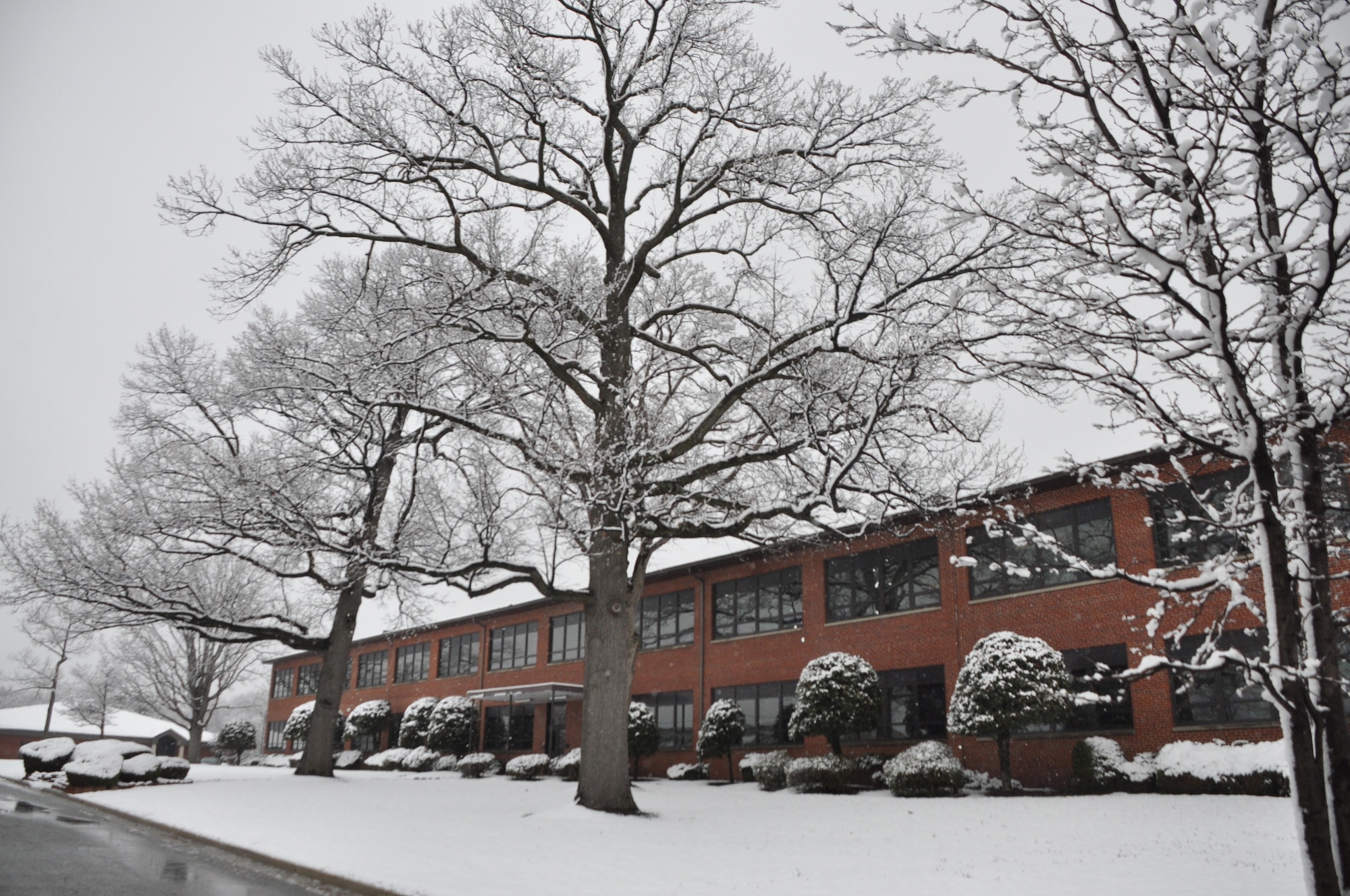 Archive photo of 459th Air Refueling Wing headquarters building covered in snow used in No Heat / No Cool story October 2018.