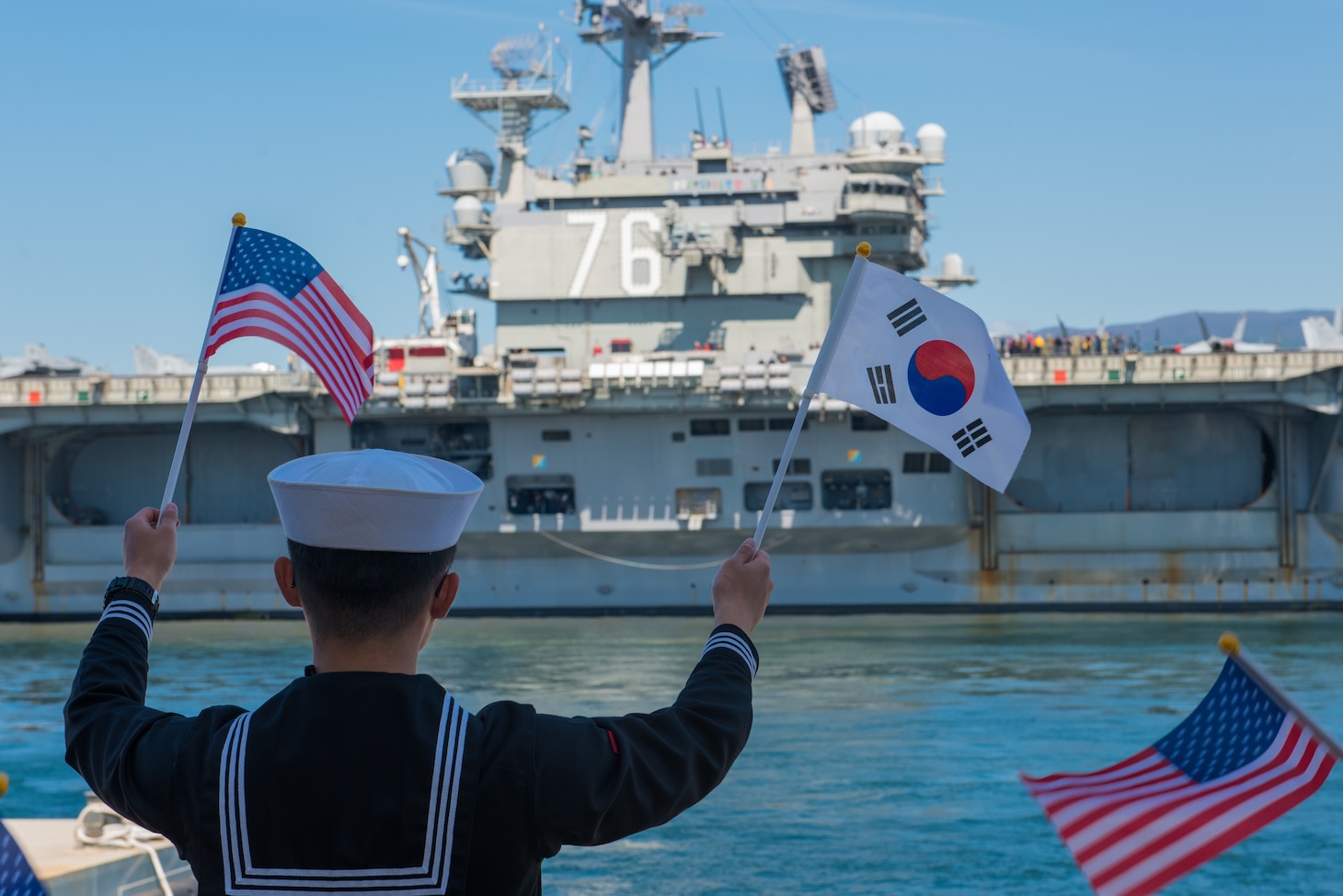 EJU ISLAND, Republic of Korea, (Oct. 12, 2018) The nimitz-class nuclear-powered aircraft carrier USS Ronald Reagan (CVN 76) pulls in to port at the Republic of Korea (ROK) Navy base in Jeju. Ronald Reagan is forward-deployed to the U.S. 7th Fleet area of operations in support of security and stability in the Indo-Pacific region.