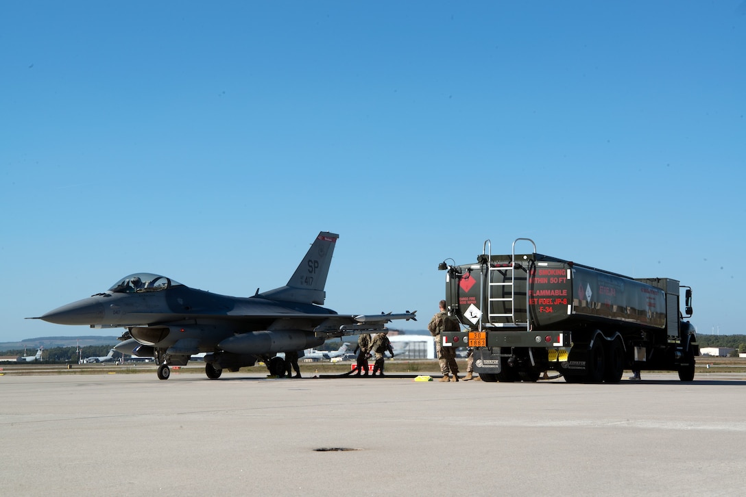 An F-16 Fighting Falcon aircraft is "hot refueled" on Ramstein Air Base, Germany, Oct. 4, 2018. A hot refuel is conducted while the engines of an aircraft are still running. The 435th Air Ground Operations Wing led Temperate Ace, a proof-of-concept exercise demonstrating strike force capabilities. (U.S. Air Force Photo by Airman 1st Class Noah D. Coger)