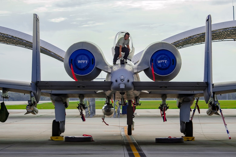 A 23rd Maintenance Group A-10C Thunderbolt II crew chief prepares an aircraft for relocation in anticipation of Hurricane Michael, Oct. 9, 2018, at Moody Air Force Base, Ga. To safeguard flying assets, Moody AFB is repositioning some aircraft to avoid the predicted tropical storm-force winds in the Southeast region. (U.S. Air Force photo by Senior Airman Greg Nash)