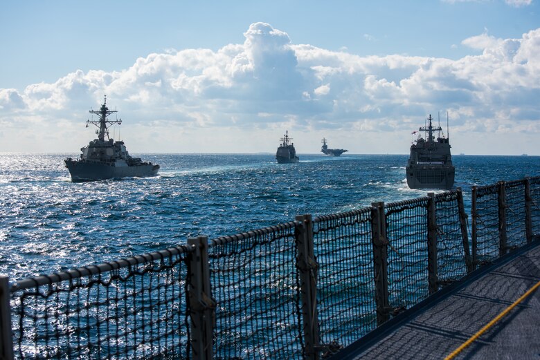JEJU ISLAND, Republic of Korea, Republic of Korea (Oct. 11, 2018) The guided-missile destroyer USS Benfold (DDG 65), guided-missile cruiser USS Chancellorsville (CG 62) and the forward-deployed nuclear-powered aircraft carrier USS Ronald Reagan (CVN 76) participate in a pass-in-review led by the Republic of Korea Ship (ROKS) Il Chu Bong (LST 688) during the ROK 2018 International Fleet Review (IFR). The IFR is conducted every 10 years and has participants and observers from more than 20 foreign navies.
