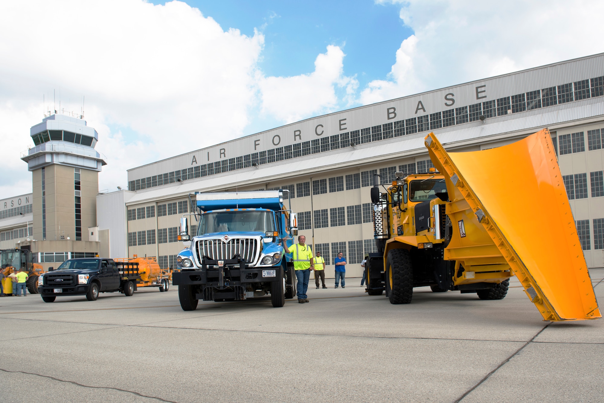 The 88th Civil Engineering Group heavy equipment and grounds crew park along the flightline after the annual Snow Parade at Wright-Patterson Air Force Base, Ohio, October 3.