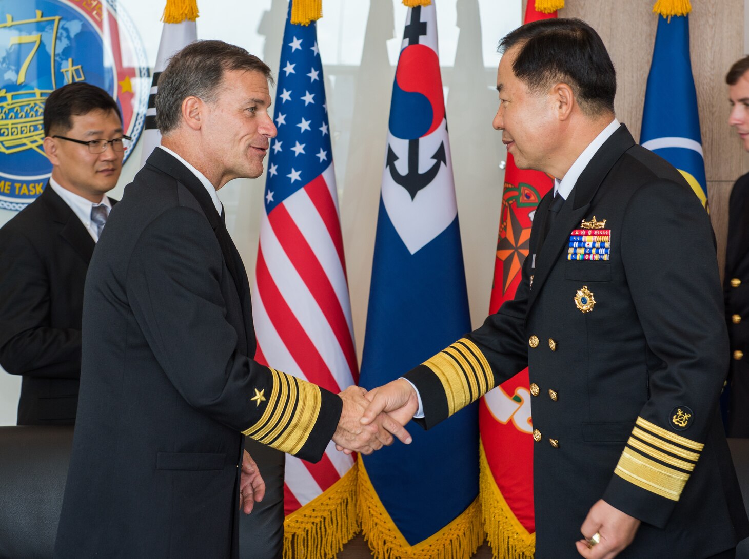 JEJU ISLAND, Republic of Korea (Oct. 11, 2018) Adm. John Aquilino, commander, U.S. Pacific Fleet, shakes hands with Republic of Korea (ROK) Chief of Naval Operations (CNO) Adm. Sim, Seung-seob during an office call in Jeju. Aquilino is visiting the ROK to observe the 2018 ROK International Fleet review as well as attend the 2018 Western Pacific Naval Symposium being hosted by the ROK Navy.