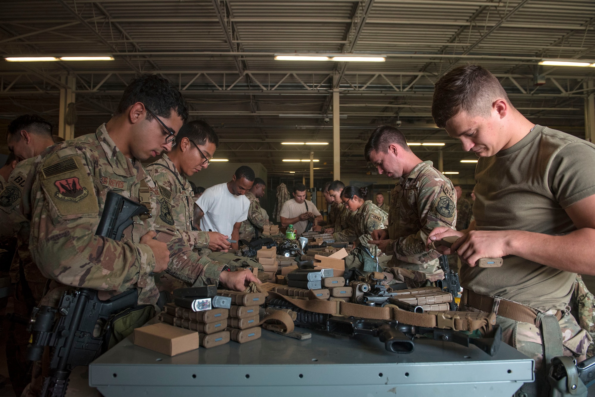 Defenders from the 822d Base Defense Squadron load ammunition prior to departing Moody Air Force Base, Ga., to provide base security at Tyndall AFB, Fla., during Hurricane Michael recovery efforts, Oct. 11, 2018. Moody’s ‘Safeside’ defenders will secure the area as Tyndall’s Ride Out Element conducts damage assessments during the aftermath. Since Oct. 8 and until further notice, Tyndall has been on evacuation notice. (U.S. Air Force photo by Senior Airman Greg Nash)