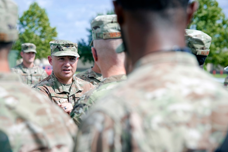 Col. Benito Barron, 820th Base Defense Group commander, briefs defenders from the 822d Base Defense Squadron before they depart Moody Air Force Base, Ga., to provide base security at Tyndall AFB, Fla. During Hurricane Michael recovery efforts, Oct. 11, 2018. Moody’s ‘Safeside’ defenders will secure the area as Tyndall’s Ride Out Element conducts damage assessments during the aftermath. Since Oct. 8 and until further notice, Tyndall has been on evacuation notice. (U.S. Air Force photo by Senior Airman Greg Nash)