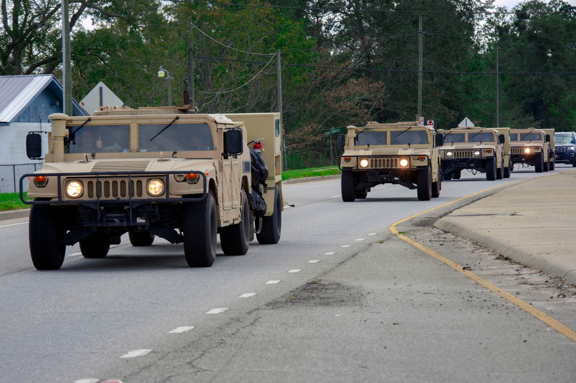 Airmen from the 822d Base Defense Squadron depart Moody Air Force Base, Ga., as they convoy en route to Tyndall AFB, Fla., to provide base security during Hurricane Michael recovery efforts, Oct. 11, 2018. Moody’s ‘Safeside’ defenders will secure the area as Tyndall’s Ride Out Element conducts damage assessments during the aftermath. Since Oct. 8 and until further notice, Tyndall has been on evacuation notice. (U.S. Air Force photo by Senior Airman Greg Nash)