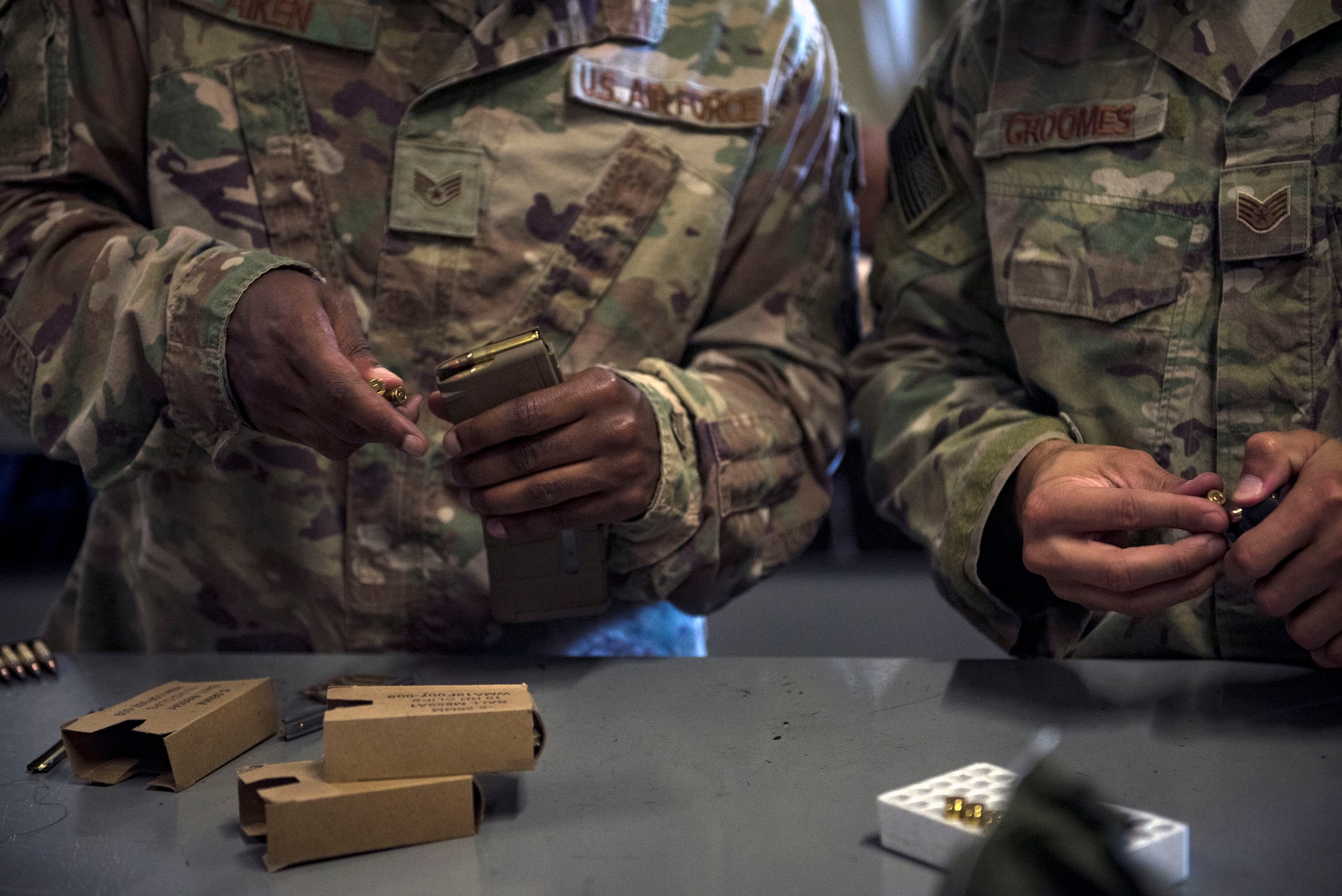 Defenders from the 822d Base Defense Squadron load ammunition into magazines prior to departing Moody Air Force Base, Ga., to provide base security at Tyndall AFB, Fla., during Hurricane Michael recovery efforts, Oct. 11, 2018. Moody’s ‘Safeside’ defenders will secure the area as Tyndall’s Ride Out Element conducts damage assessments during the aftermath. Since Oct. 8 and until further notice, Tyndall has been on evacuation notice. (U.S. Air Force photo by Senior Airman Greg Nash)