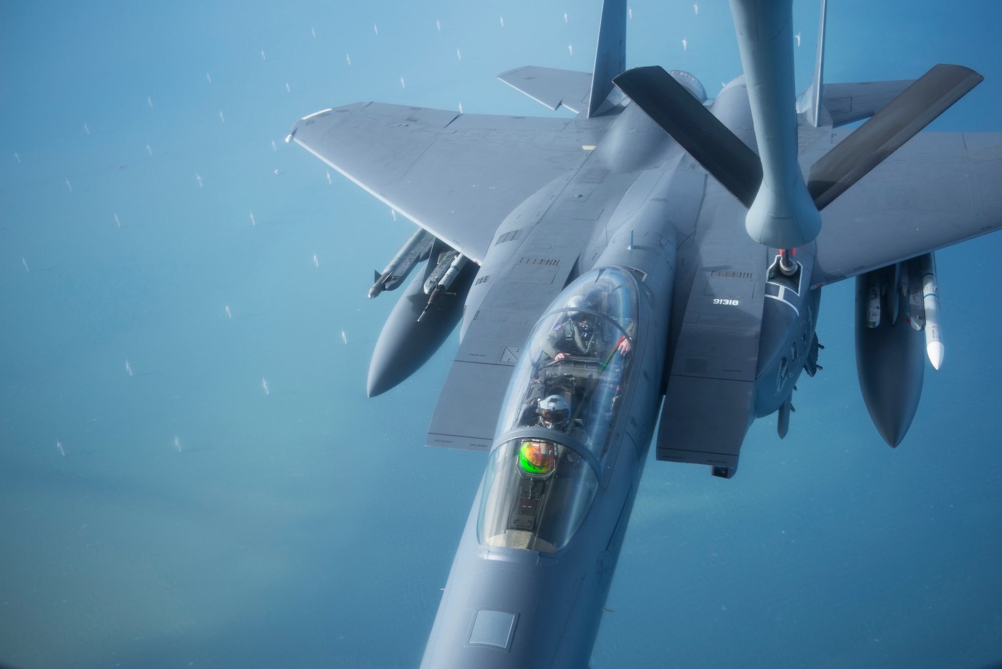 A U.S. Air Force F-15E Strike Eagle assigned to RAF Lakenheath, England, takes on fuel from a U.S. Air Force KC-135 Stratotanker assigned to RAF Mildenhall, England, off the coast of England, Oct. 11, 2018. RAF Lakenheath hosted a large forces exercise that included F-22 Raptors from Joint Base Langley-Eustis, Va., F-15E Strike Eagles from RAF Lakenheath and F/A-18 Super Hornets from the Carrier Air Wing from USS Harry S. Truman (CVN-75). (U.S. Air Force photo by Tech. Sgt. Emerson Nuñez)