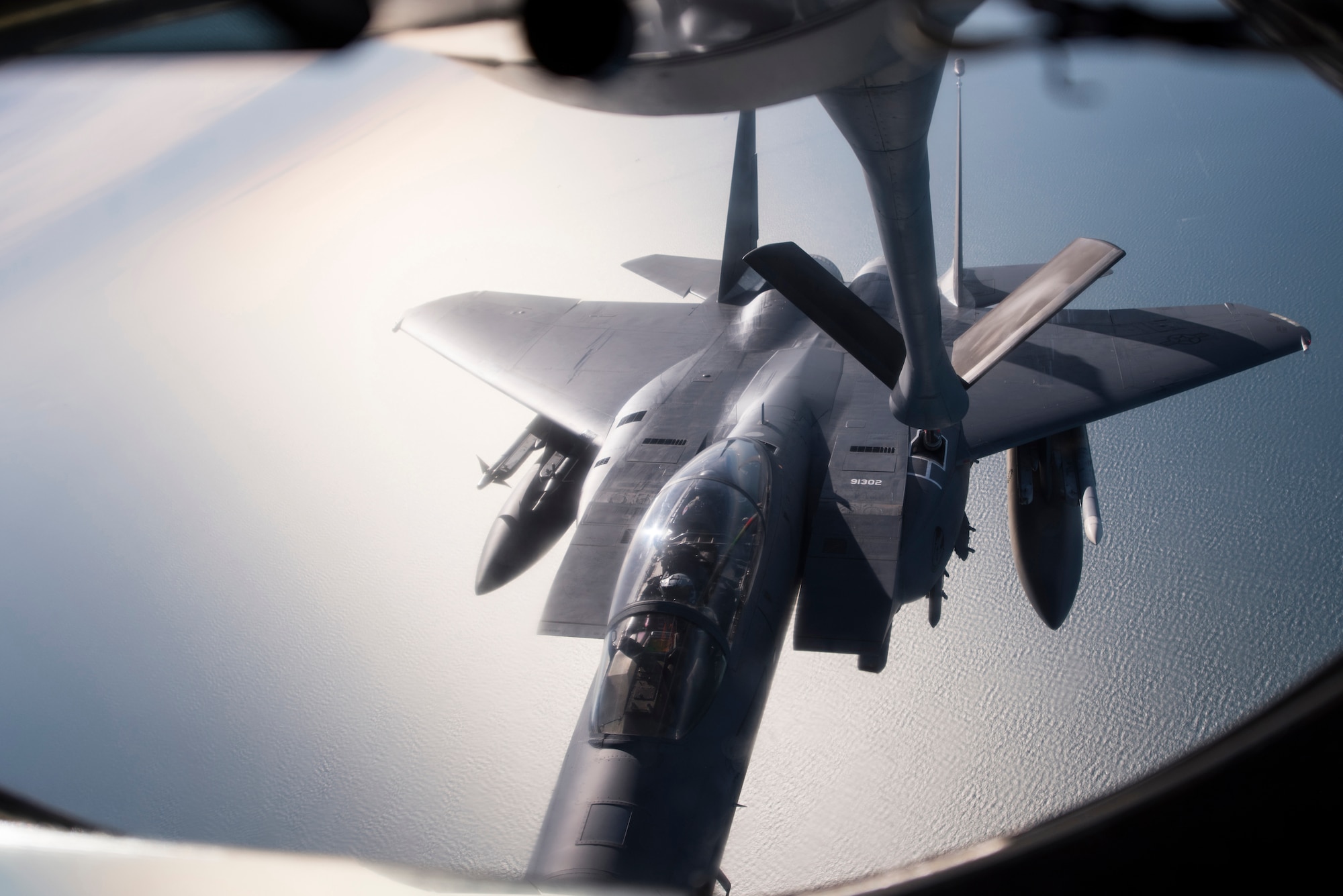 A U.S. Air Force F-15E Strike Eagle assigned to RAF Lakenheath, England, takes on fuel from a U.S. Air Force KC-135 Stratotanker assigned to RAF Mildenhall, England, off the coast of England, Oct. 11, 2018. RAF Lakenheath hosted a large forces exercise that included F-22 Raptors from Joint Base Langley-Eustis, Va., F-15E Strike Eagles from RAF Lakenheath and F/A-18 Super Hornets from the Carrier Air Wing from USS Harry S. Truman (CVN-75). (U.S. Air Force photo by Tech. Sgt. Emerson Nuñez)