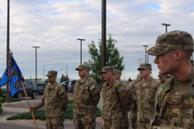 341st Security Forces Group defenders stand in formation for reveille June 23, 2017, at Malmstrom Air Force Base, Mont.
