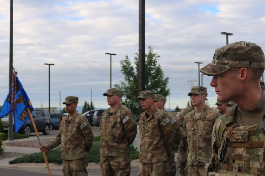 341st Security Forces Group defenders stand in formation for reveille June 23, 2017, at Malmstrom Air Force Base, Mont.