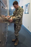A 12th Training Squadron detail Airman, sorts through the Order of Daedalion’s flight records April 18, 2018 at the Daedalian Foundation National Headquarters building on Joint Base San Antonio-Randolph, Texas. The Order of Daedalians has a record of every military flight conducted by its members organized and on file for those interested to look through. (U.S. Air Force photo by Airman Shelby Pruitt)