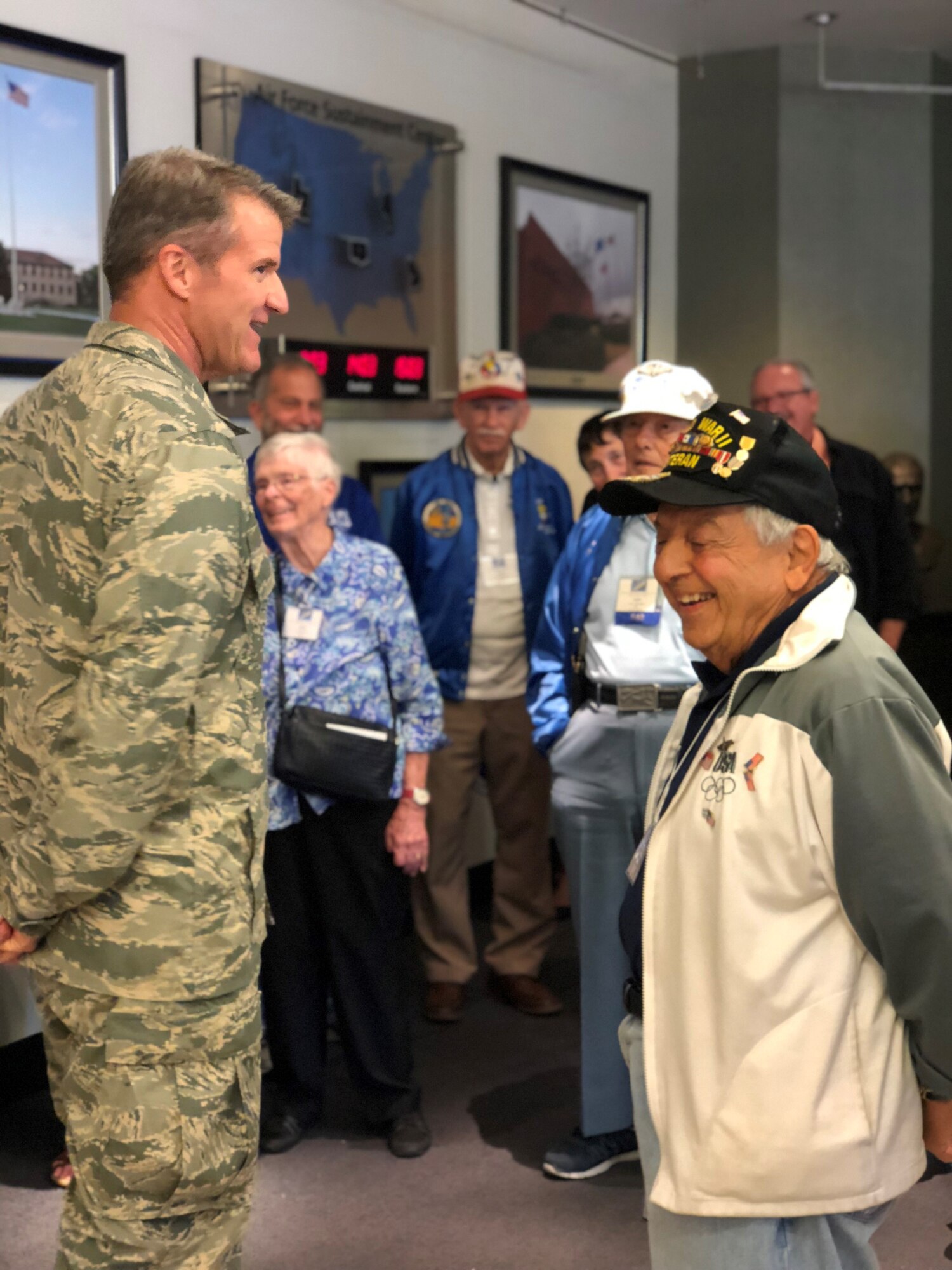 Oklahoma City Air Logistics Complex Commander Brig. Gen. Chris Hill visited with nine World War II veterans and their family members Sept. 28 before they toured Bldg. 3001 on Tinker AFB. The 483rd Bombardment Group was the last B-17 Flying Fortress unit trained in the United States, and their tour of the OC-ALC involved first-hand visuals on how the engine mecca of the Air Force supports the warfighter. Technological advancements have significantly changed since their time in service. These national heroes learned how their impact paved the way and how aircraft flown decades ago are still operable today due to the workforce and sustainability at Tinker AFB. (U.S. Air Force photo/Jillian Coleman)