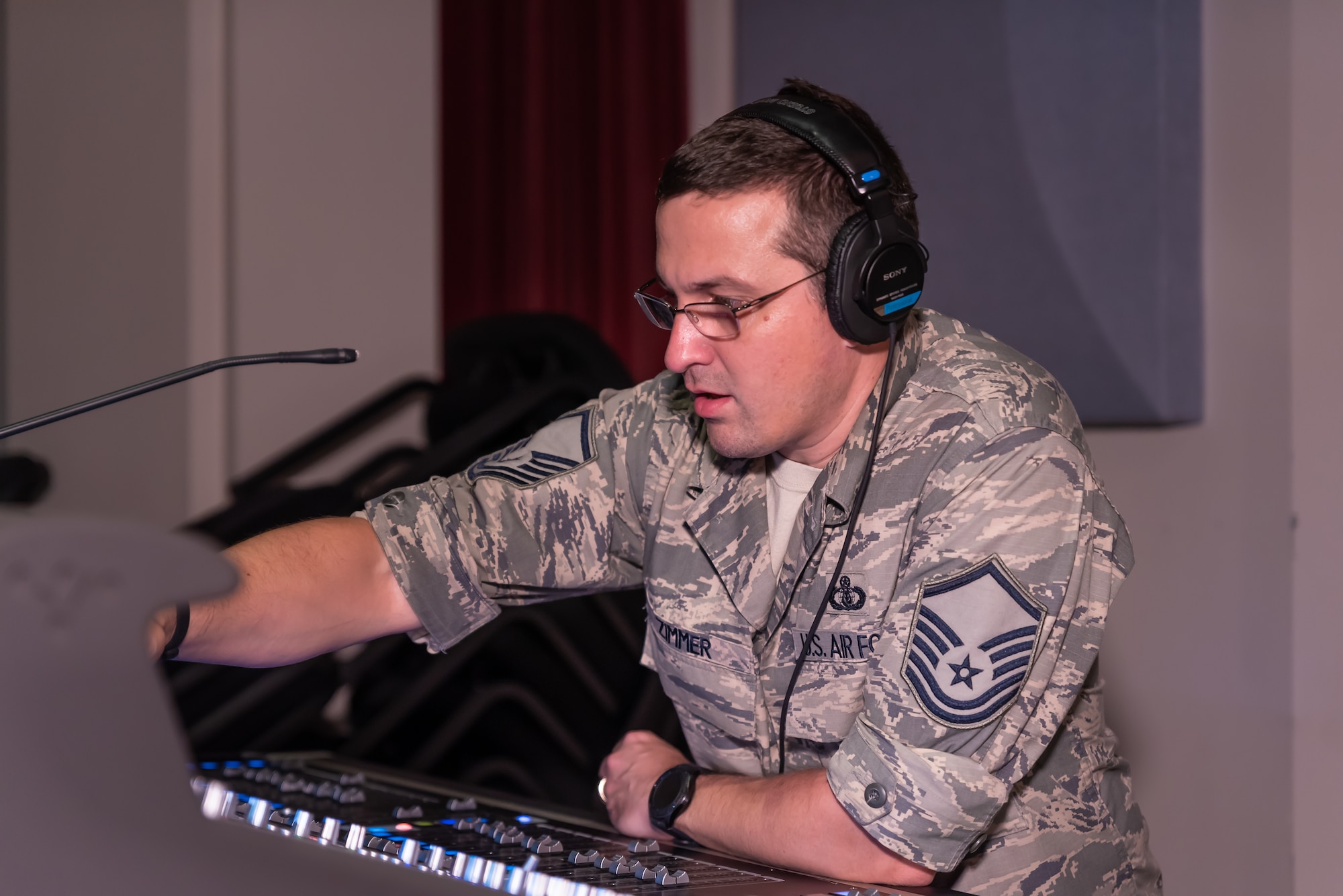 Audio Engineer Master Sgt. Loren Zimmer monitors audio levels during a recent rehearsal for the 2018 Fall tour