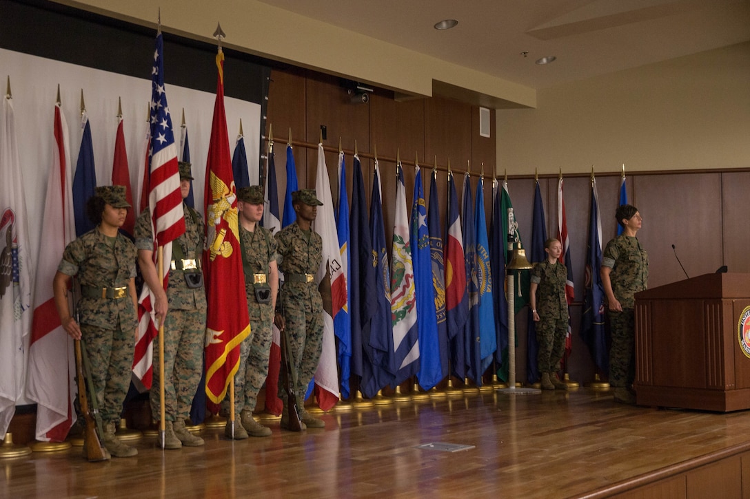 Marine and Sailors stand during the playing of Anchors Aweigh and the Marines’ Hymn during the Navy Birthday Cake Cutting Ceremony at Marine Corps Support Facility New Orleans, La., Oct. 12, 2018. Marines and sailors with Marine Corps Support Facility honor and celebrate the Navy’s 243rd Birthday with a traditional cake cutting ceremony. (U.S. Marine Corps photo by Lance Cpl. Samantha Schwoch/released)