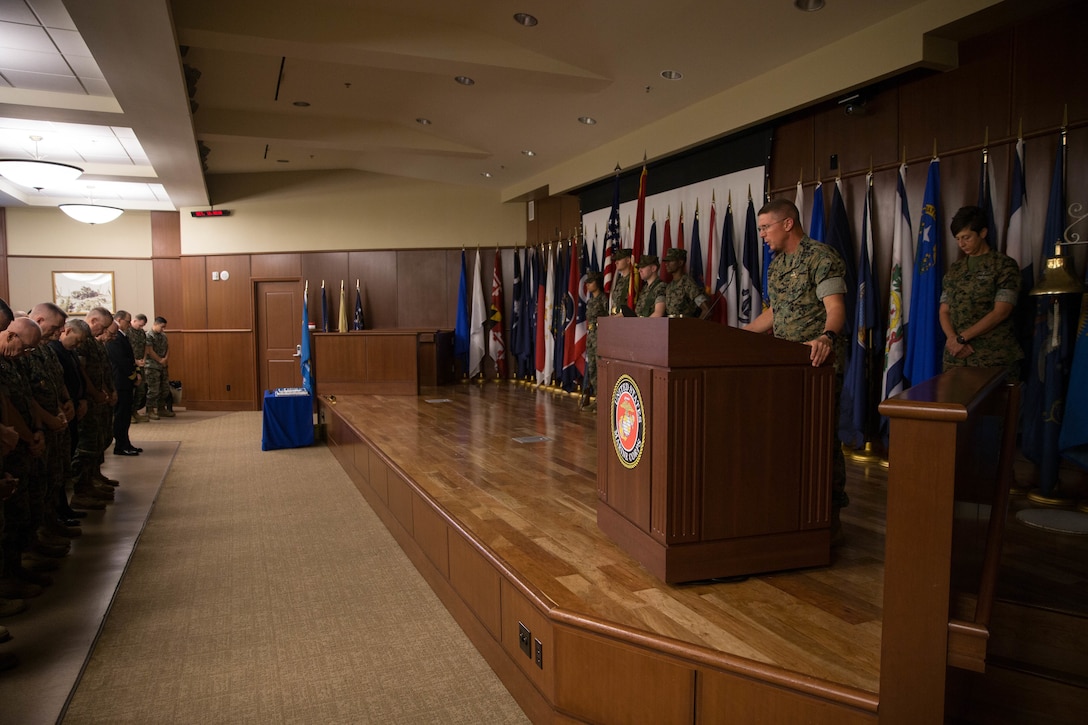 Capt. Henry Holcombe, Force Chaplain, Marine Forces Reserve, gives the invocation before commencement of the Navy Birthday Cake Cutting Ceremony at Marine Corps Support Facility New Orleans, La., Oct. 12, 2018. Marines and sailors with Marine Corps Support Facility honor and celebrate the Navy’s 243rd Birthday with a traditional cake cutting ceremony. (U.S. Marine Corps photo by Lance Cpl. Samantha Schwoch/released)