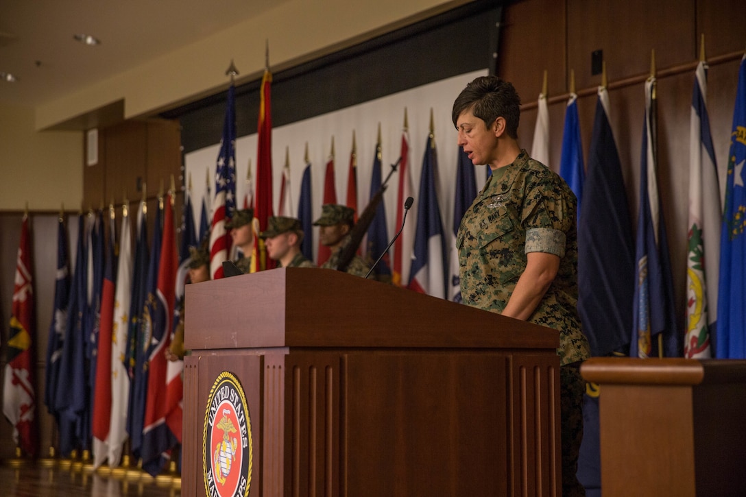 Senior Chief Petty Officer Lanna Begnaud, Senior Enlisted Leader, 4th Marine Division Surgeons Office, Marine Forces Reserve, narrates the Navy Birthday Cake Cutting Ceremony at Marine Corps Support Facility New Orleans, La., Oct. 12, 2018. Marines and sailors with Marine Corps Support Facility honor and celebrate the Navy’s 243rd Birthday with a traditional cake cutting ceremony. (U.S. Marine Corps photo by Lance Cpl. Samantha Schwoch/released)