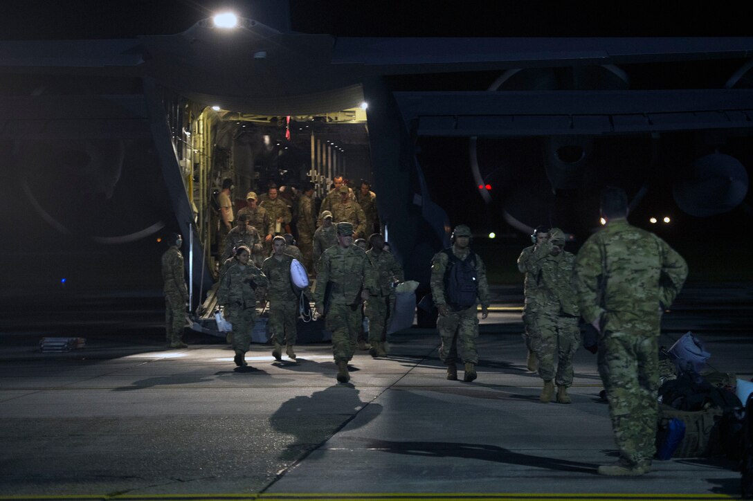 Airmen from the 41st Rescue Squadron (RQS) return home from a deployment, Oct. 9, 2018, at Moody Air Force Base, Ga. While deployed, the 41st RQS and the 41st Helicopter Maintenance Unit provided combat search and rescue capabilities and maintenance operations in a forward location. (U.S. Air Force photo by Senior Airman Greg Nash)