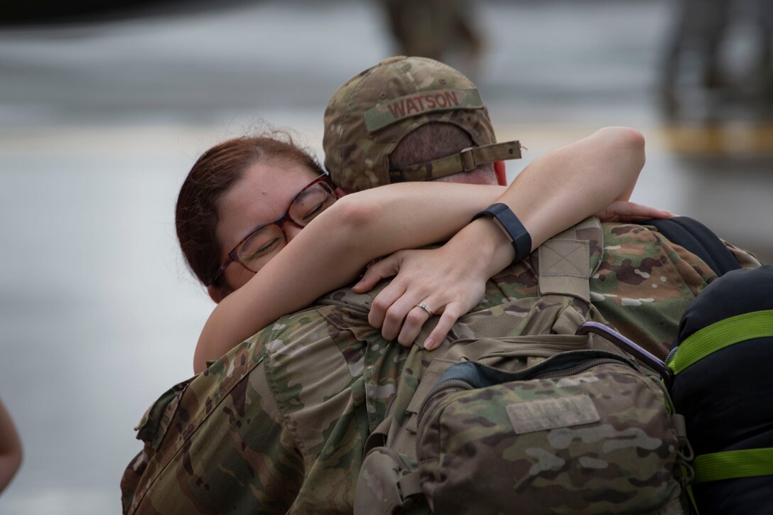 Master Sgt. James Watson, 71st Rescue Squadron (RQS) readiness superintendent, greets a loved one during a redeployment ceremony, Oct. 9, 2018, at Moody Air Force Base, Ga. The 71st RQS maintains combat-ready status and provides deployable personnel recovery forces to theater commanders for contingency and crisis response operations worldwide. (U.S. Air Force photo by Airman Taryn Butler)