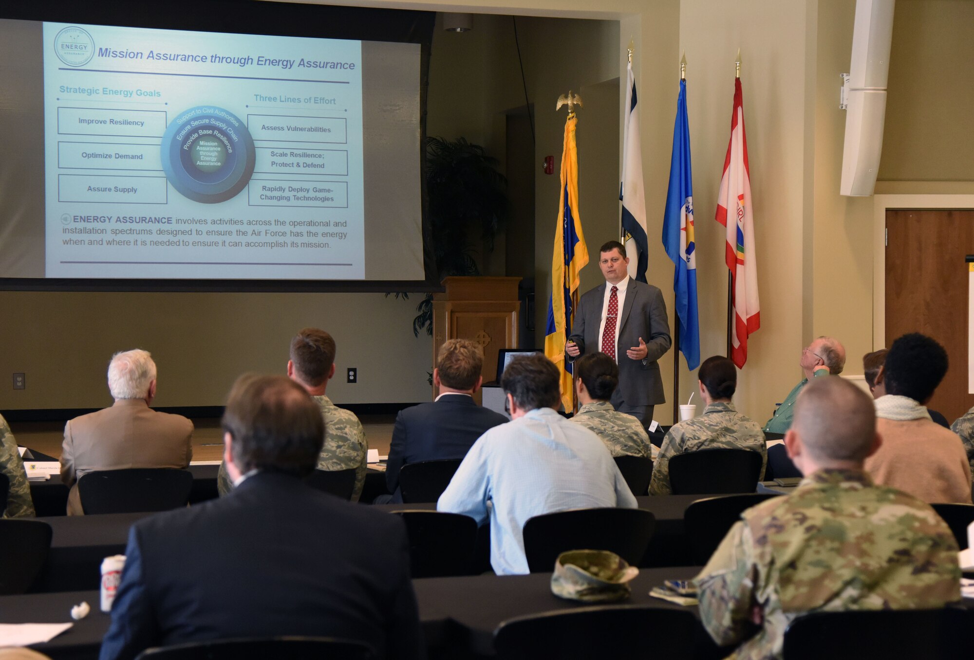 David Irwin, Office of Energy Assurance opportunity development director, delivers a briefing to Keesler and community leaders during the Keesler/Mississippi Gulf Coast Community Partnership Workshop at the Salvation Army Kroc Center in Biloxi, Mississippi, Oct. 10, 2018. The program is part of a larger Air Force Public-Public, Public-Private initiative to encourage installations and local communities to combine or improve resources or operating processes. Mississippi representatives from state and local communities and various civic leaders attended the event. (U.S. Air Force photo by Kemberly Groue)